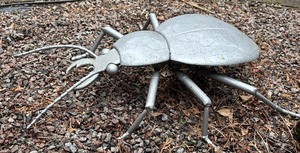 lot 89 image: Yard Decor Large Silver Colored Beatle Figurine