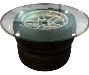 lot 38 image: Unique Coffee Table Made with Tires and Glass Top