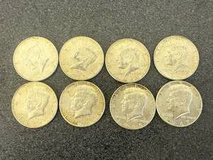 lot 37 image: 8 Kennedy Half Dollars 40% Silver