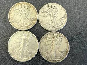 lot 69 image: 4 1942 Walking Liberty Half Dollars