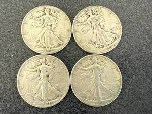 lot 73 image: 4 1945 Walking Liberty Half Dollars