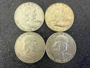 lot 79 image: 4 1954 Franklin Half Dollars