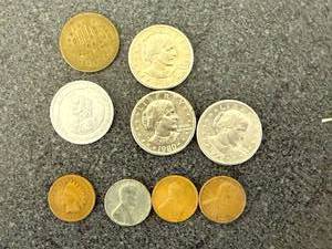 lot 105 image: 1906 Indian Head Penny, Ashley ND Phillips 66 Token, Cracker Jacks Token, Steel Penny, Susan B Dollars