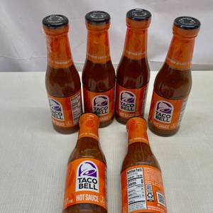 lot 394 image: MM. 6x 7.5oz Taco Bell Hot Sauce