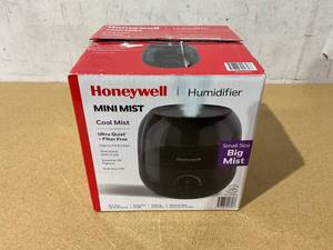lot 257 image: Honeywell 12 gal. Mini Cool Mist Humidifier, 250 sq. ft