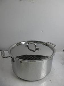 lot 25 image: All-Clad D3 3-Ply Stainless Steel Stockpot with Lid 8 Quart, Induction, Oven Broiler Safe 600F, Silver WATER MARKS, SCRATCHES, USED