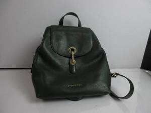 lot 75 image: Michael Kors Pebble Leather Moss Green Medium Backpack HAS A USED SMELL, HAS SCUFFS AROUND BUTTON AND BOTTOM, USED