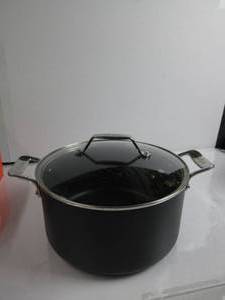 lot 82 image: All-Clad Essentials Nonstick Cookware (7 Quart Stock Pot with Glass Lid) SCRATCHED, SLIGHTLY USED