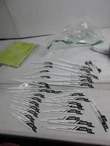 lot 128 image: RYOBI 34 PC. 1 PIECE IS MISSING Reciprocating Saw Blade Set SLIGHTLY USED