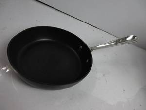 lot 130 image: All-Clad HA1 Hard Anodized Nonstick Fry Pan Cookware (8 Inch Fry Pan) DENTED, CHIPPED, LIGHT SCRATCHES ON BOTTOM, NEW
