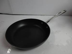 lot 131 image: All-Clad Essentials Nonstick Cookware (10.5 Inch Fry Pan) SCRATCHES, LIGHTLY CHIPPED, USED