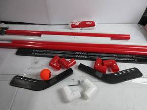 lot 138 image: Franklin Sports Hockey Goal Ball and Stick Set - NHL EVERYTHING IN THERE, OPEN BOX, LIKE NEW