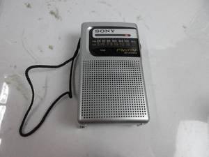 lot 144 image: Sony ICF-S10MK2 Pocket AMFM Radio, Silver TESTED, WORKS, BATTERIES NOT INCLUDED, USED