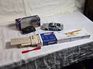 lot 252 image: Corgi Diecast London Taxi and Comet Aeronca K Model Kit