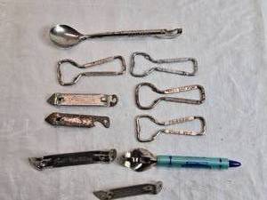 lot 281 image: Variety of Bottle Openers - Grain Belt, Premium and More