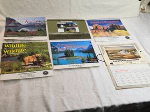lot 291 image: Vintage Calendars and Promotional Materials including 1997, 1999, and 2000