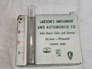 lot 295 image: Larsons Implement and Automobile Company Rain Gauge