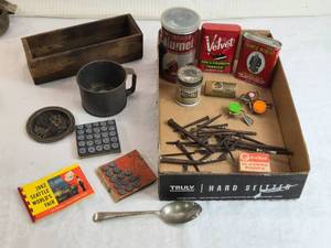lot 309 image: Collectibles and Memorabilia Lot including tobacco tins, a Calumet baking powder tin, a 1962 Seattle Worlds Fair souvenir book
