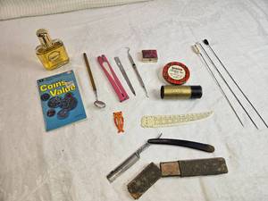 lot 323 image: Aftershave, Coin Guide, Tools, and Straight Razor