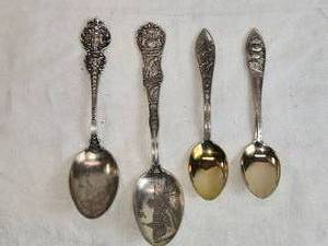 lot 335 image: Antique Sterling Silver Souvenir Spoons Iowa, Michigan, Wyoming, and Black Hills