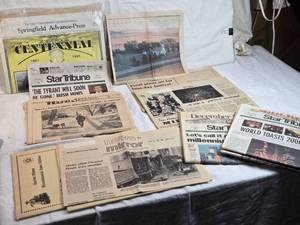 lot 360 image: Assortment of Vintage Newspapers and Special Editions including and More Springfield Advance-Press Centennial Edition from 1981, Star Tribune issues covering events like New Years 2000, and a special message from the White House dated July 10, 1978