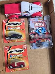 lot 10 image: Set of Die-Cast Cars Pepsi Truck, Matchbox Police Car, Fire Engine, and Marvel Spider-Man