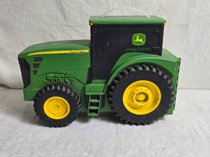 lot 17 image: John Deere Toy Tractor Case with Toys Inside