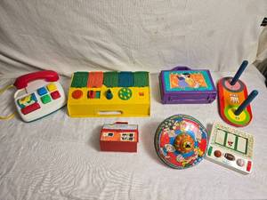 lot 45 image: Vintage Childrens Toys Collection Fisher-Price pretend phone, Hunchback of Notre Dame Lunchbox and More