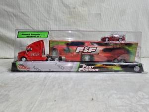 lot 56 image: Fast and Furious Kenworth Transporter by Ertl