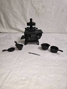 lot 68 image: Vintage Queen Cast Iron Miniature Stove with Accessories