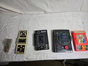 lot 77 image: Vintage Handheld Electronic Game Collection - Tomy Driving Games, Hit and Missile, Head to Head Football