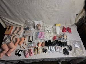 lot 91 image: Assorted Doll Clothing and Accessories