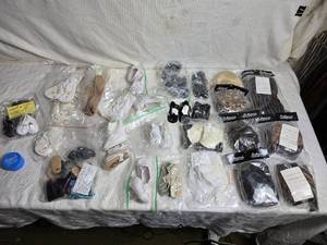 lot 92 image: Doll Supplies including Shoes, Hairpieces, and Socks