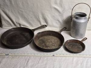 lot 149 image: Cast Iron Skillets and Milk Can