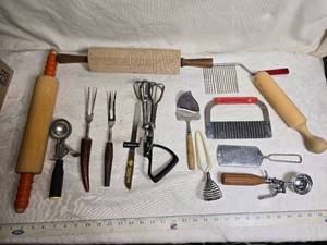 lot 162 image: Kitchen Utensil Collection with Rolling Pins, Peelers, and More