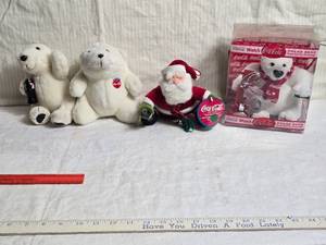 lot 206 image: Coca-Cola Collectible Plush Polar Bears and Santa Ornament Set