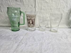 lot 210 image: Coca-Cola Glasses Featuring Vintage Designs