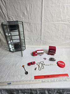 lot 212 image: Coca-Cola Memorabilia Bottle Openers, Spoon, Toy Truck and Including Decorative Display Case