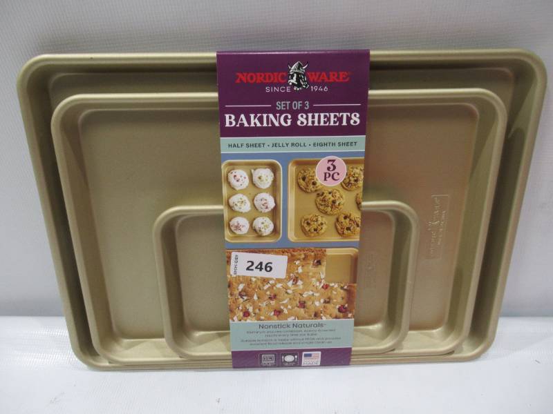 lot 333 image: NEW Nordic Ware 3-Piece Nonstick Baking Sheet Set, Half Sheet, Jelly Roll, & Eighth Sheet - Gold