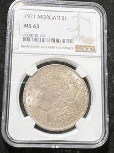 lot 12 image: 1921 US MORGAN SILVER DOLLAR NGC MS63