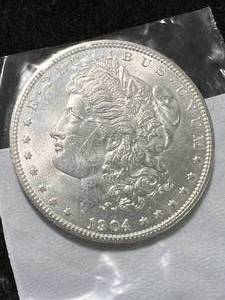 lot 19 image: 1904-O US MORGAN SILVER DOLLAR