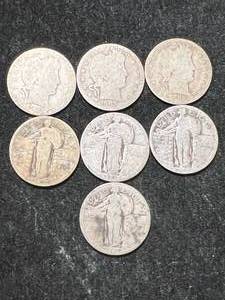 lot 40 image: GROUP OF 7 US SILVER QUARTERS (3 BARBERS WITH 4 STANDING LIBERTIES)