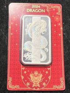 lot 44 image: 50 GRAMS .999 FINE SILVER 2024 DRAGON BAR IN CASE
