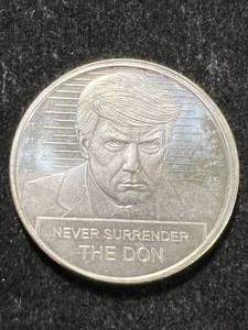 lot 66 image: 1 TROY OZ .999 FINE SILVER DONALD TRUMP ROUND
