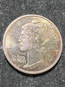 lot 69 image: 1 TROY OZ .999 FINE SILVER PEACE DOLLAR ROUND