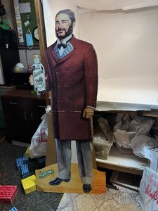 lot 43 image: Dr. McGillicuddys Schnapps Life-Size Cardboard Statue
