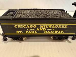 lot 38 image: HO Scale 612 Mother Hubbard Steam Engine & Chicago, Milwaukee and St Paul Railway Hopper