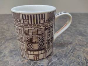 lot 16 image: Henri Bendel 120th Anniversary Mug