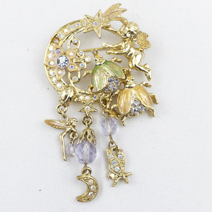 lot 285 image: Kirks Folly Crystal Fairy Fire Flies Gold Tone Base Metal Brooch .