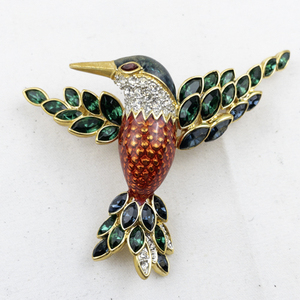 lot 292 image: Nolan Miller Enamel & Rhinestone Gold Plated Brooch .